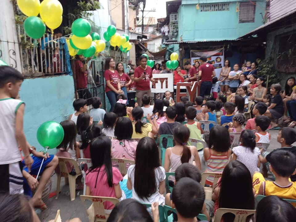 Giving gifts and fun games to Children in Teresa PUP with Freedom Youth Initiatives